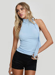 front view of model wearing Princess Polly Mathias Top Blue Sleeveless High Neck 