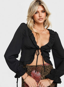 front view of model wearing Princess Polly Evadne Long Sleeve Top Black Full Sleeves Plunger 