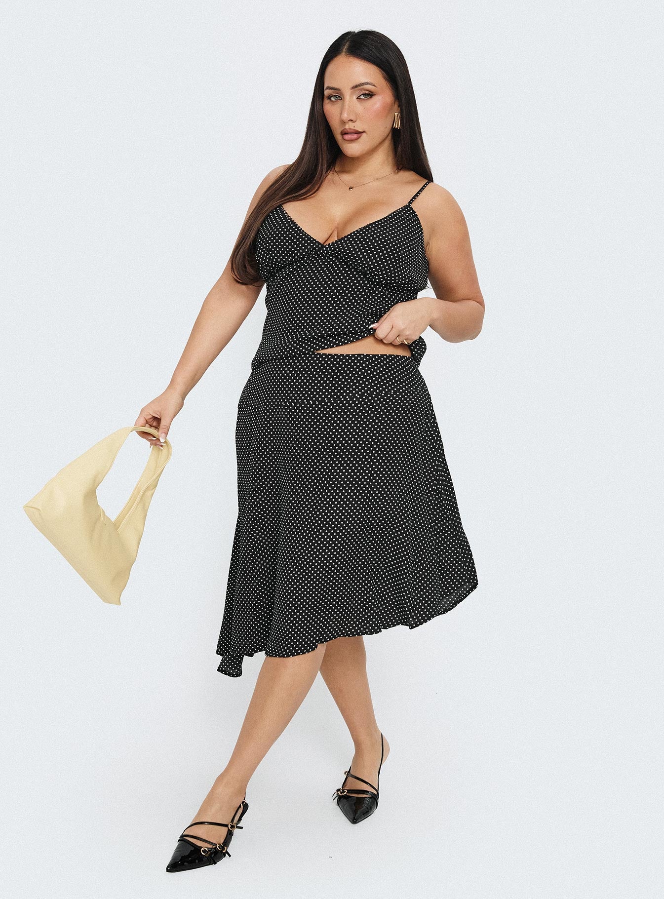 Cabernet Asymmetrical Set Black Polka Curve