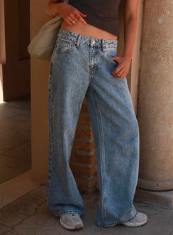 side view of model wearing Princess Polly Shima Low Rise Straight Leg Jeans Light Wash Low Rise Jeans 