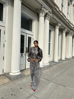 Faux leather bomber jacket High neckline, zip fastening, twin hip pockets, elasticated waistband and cuff Non-stretch material, fully lined 