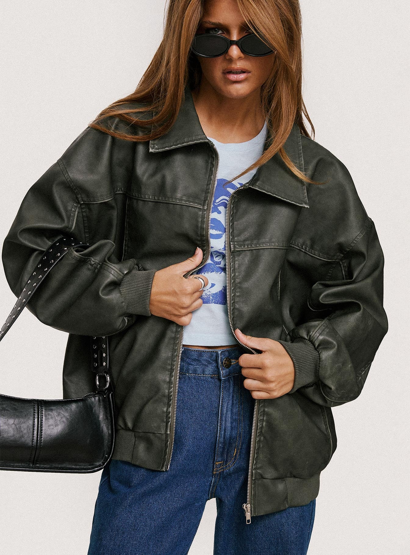 Faux leather bomber jacket Classic collar, ribbed waistband and cuffs, zip front fastening, twin hip pockets 