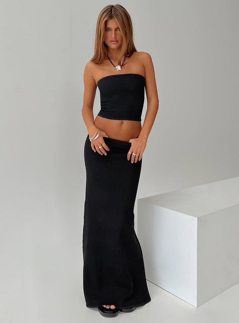side view of model wearing Princess Polly Huckle Tube Top Black Sleeveless straight 