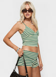 side view of model wearing Princess Polly Miztaray Cami Top Green / Cream Stripe Sleeveless V-Neck 