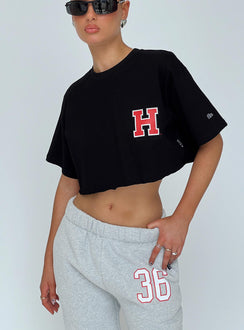 front view of model wearing Princess Polly Harvard Graphic Track Top Black Short Sleeves Crew Neck 