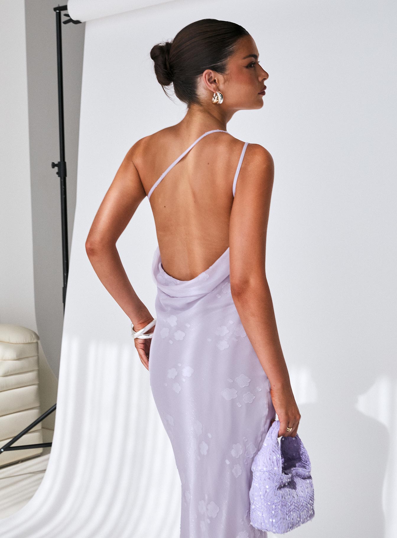 back view of model wearing Princess Polly Jazmira One Shoulder Maxi Dress Lilac Asymmetric Neckline 