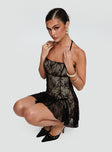 side view of model wearing Princess Polly Delamere Lace Mini Dress Black Straight Neck 