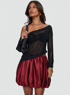   side view of model wearing Princess Polly Rubee Bubble Hem Mini Skirt Red Mini Skirts 