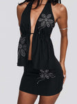 side view of model wearing Princess Polly Quotation Diamante Halter Backless Top Black Sleeveless Plunger 