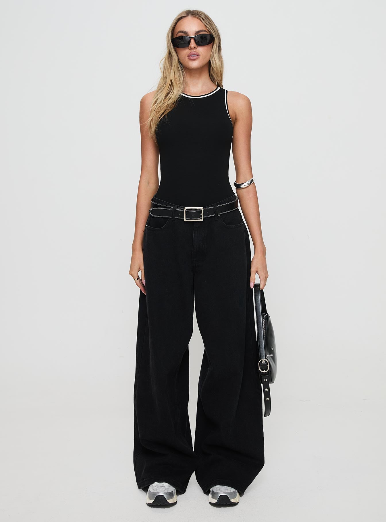 front view of model wearing Princess Polly Pietra Bodysuit Black Sleeveless 