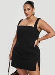 side view of model wearing Princess Polly Bombshell Mini Dress Black Curve Square Neck 