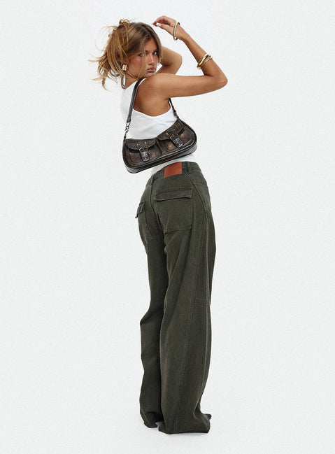 side view of model wearing Princess Polly Bruiser Tie Waist Mid Rise Wide Leg Jeans Green High Rise Jeans 