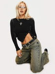 front view of model wearing Princess Polly Karre Off The Shoulder Long Sleeve Top Black Full Sleeves Asymmetric Neckline 