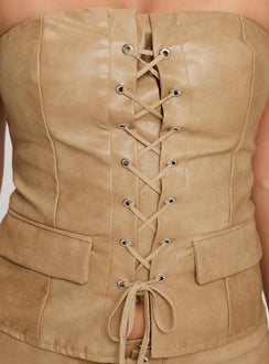 back view of model wearing Princess Polly Anaheim Strapless Top Beige Sleeveless straight 