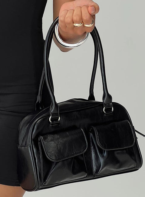 Black bag Silver-toned hardware, zip fastening, twin external pockets with magnetic button fastening, internal zip pocket, flat base