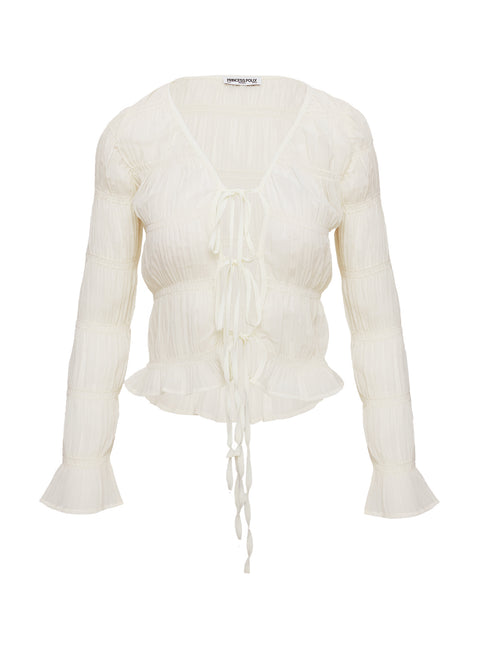 back view of model wearing Princess Polly Carnelian Frill Long Sleeve Top Cream Full Sleeves V-Neck 