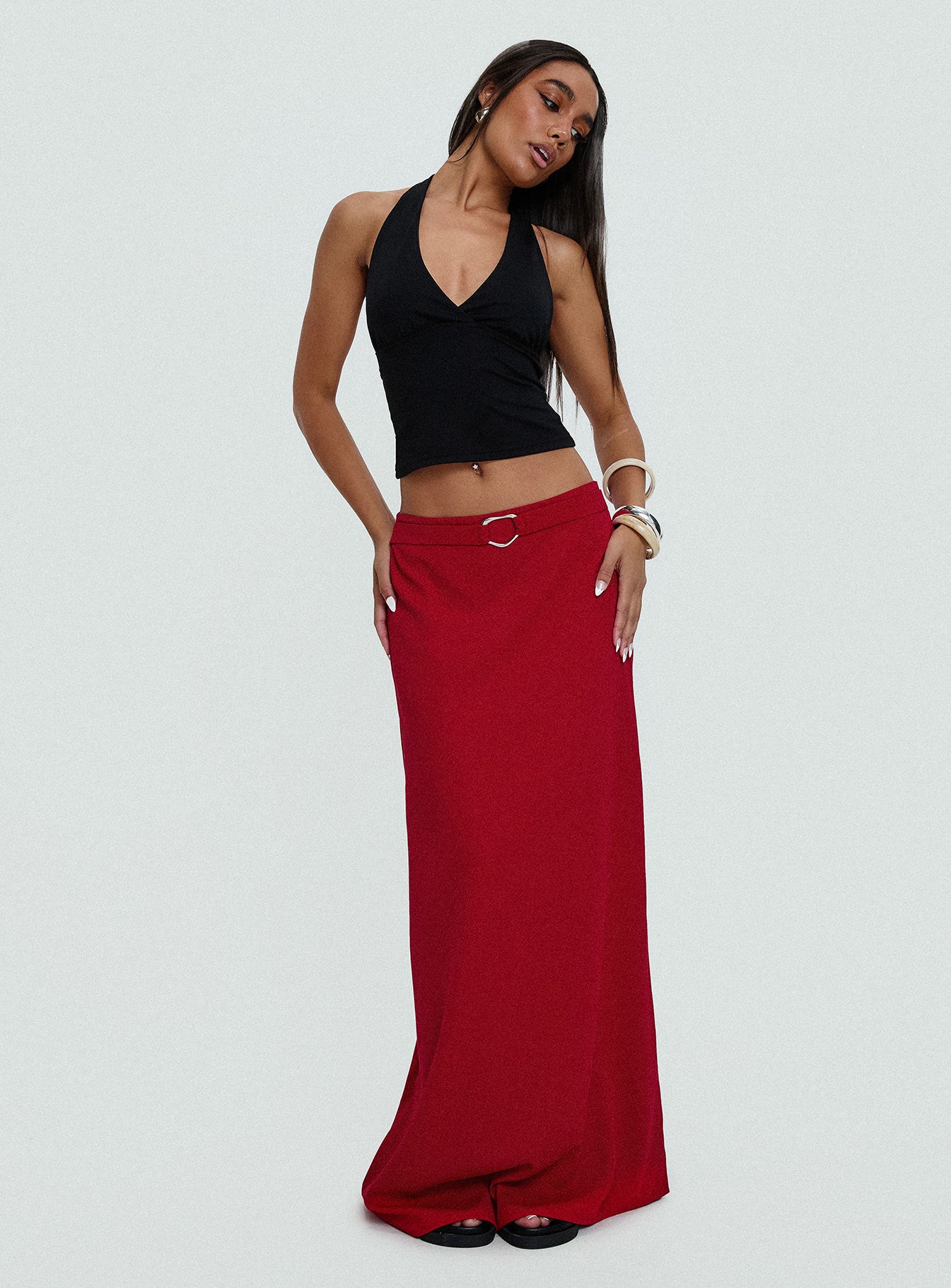   side view of model wearing Princess Polly Devoted Maxi Skirt Red Maxi 
