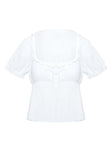 side view of model wearing Princess Polly Elizabette Puff Sleeve Top White Short Sleeves Scoop Neck 