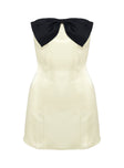 side view of model wearing Princess Polly Kesy Bow Tie Mini Dress Cream / Black Straight Neck 