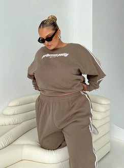 side view of model wearing Princess Polly Princess Polly Crew Neck Sweatshirt Stripe Taupe / White Curve 