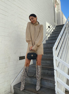 back view of model wearing Princess Polly Zahara Mini Dress Beige Petite High Neck 