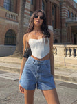 front view of model wearing Princess Polly Tropicana Shorts Denim Lower Impact High Waisted Shorts 