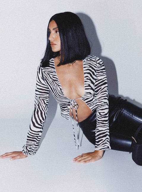 front view of model wearing Princess Polly Daniella Long Sleeve Top Zebra 