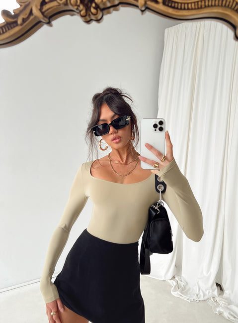 side view of model wearing Princess Polly Mallard Bodysuit Brown Full Sleeves Scoop Neck 