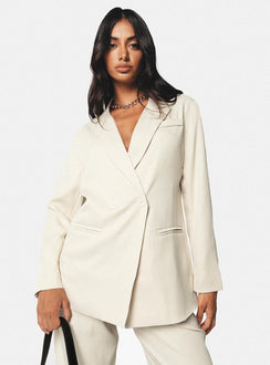 Blazer Silky material  Lapel collar  Double-breasted  Twin hip pockets  Non-stretch 