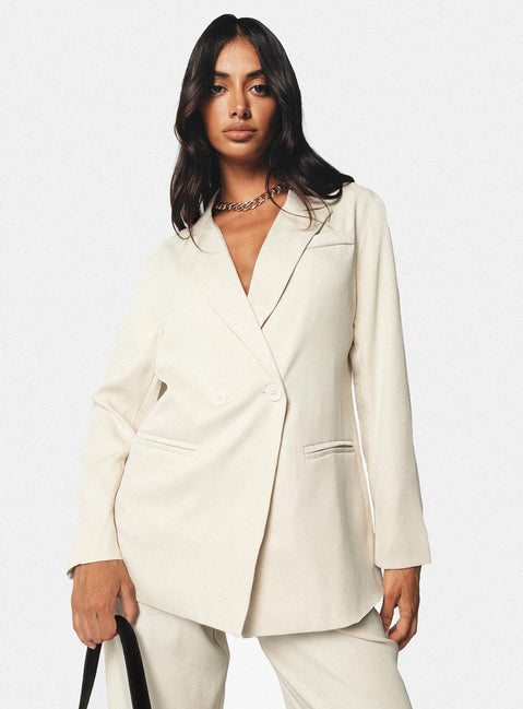 Blazer Silky material  Lapel collar  Double-breasted  Twin hip pockets  Non-stretch 