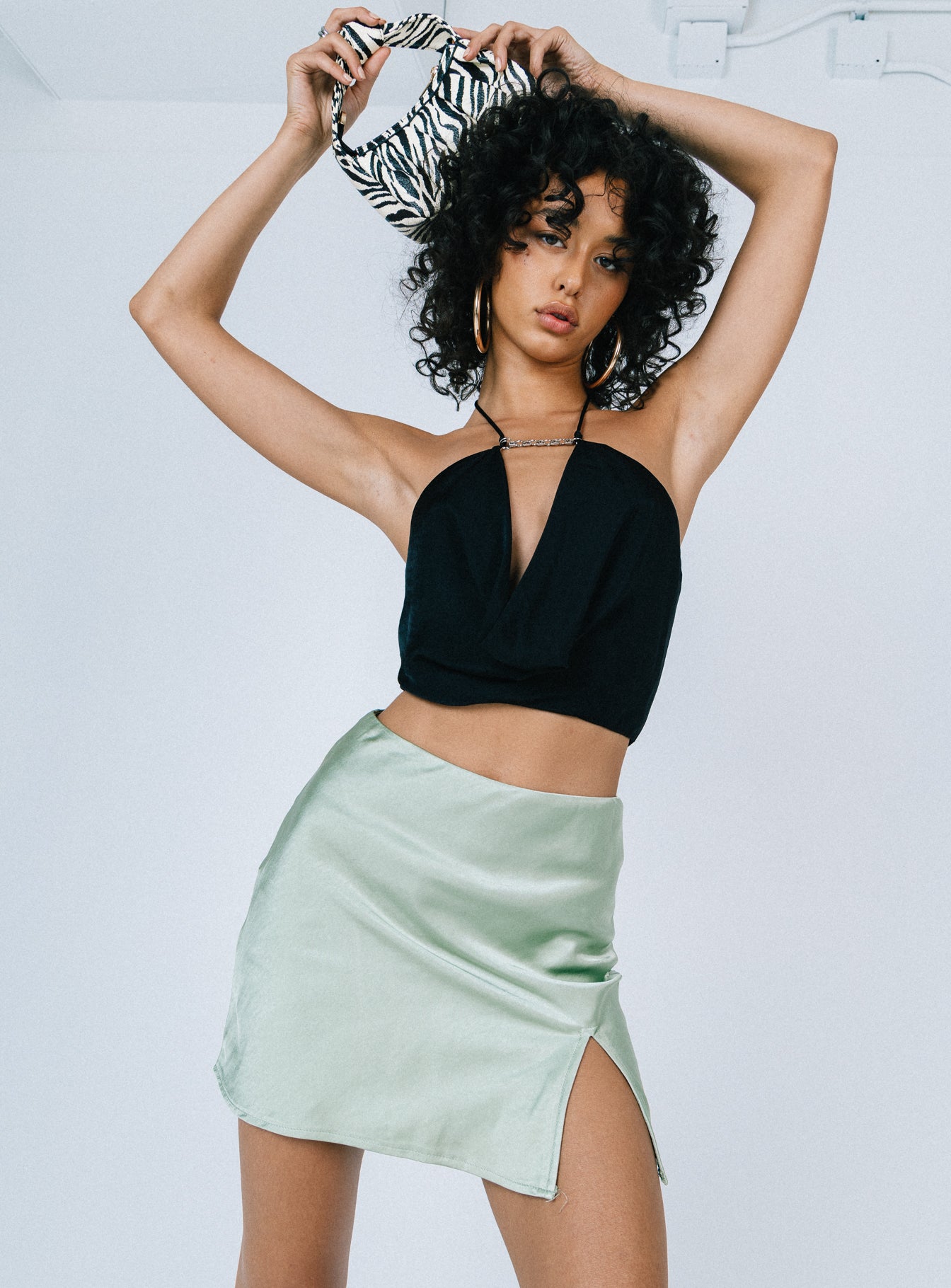   front view of model wearing Princess Polly Keelia Mini Skirt Green Mini Skirts 