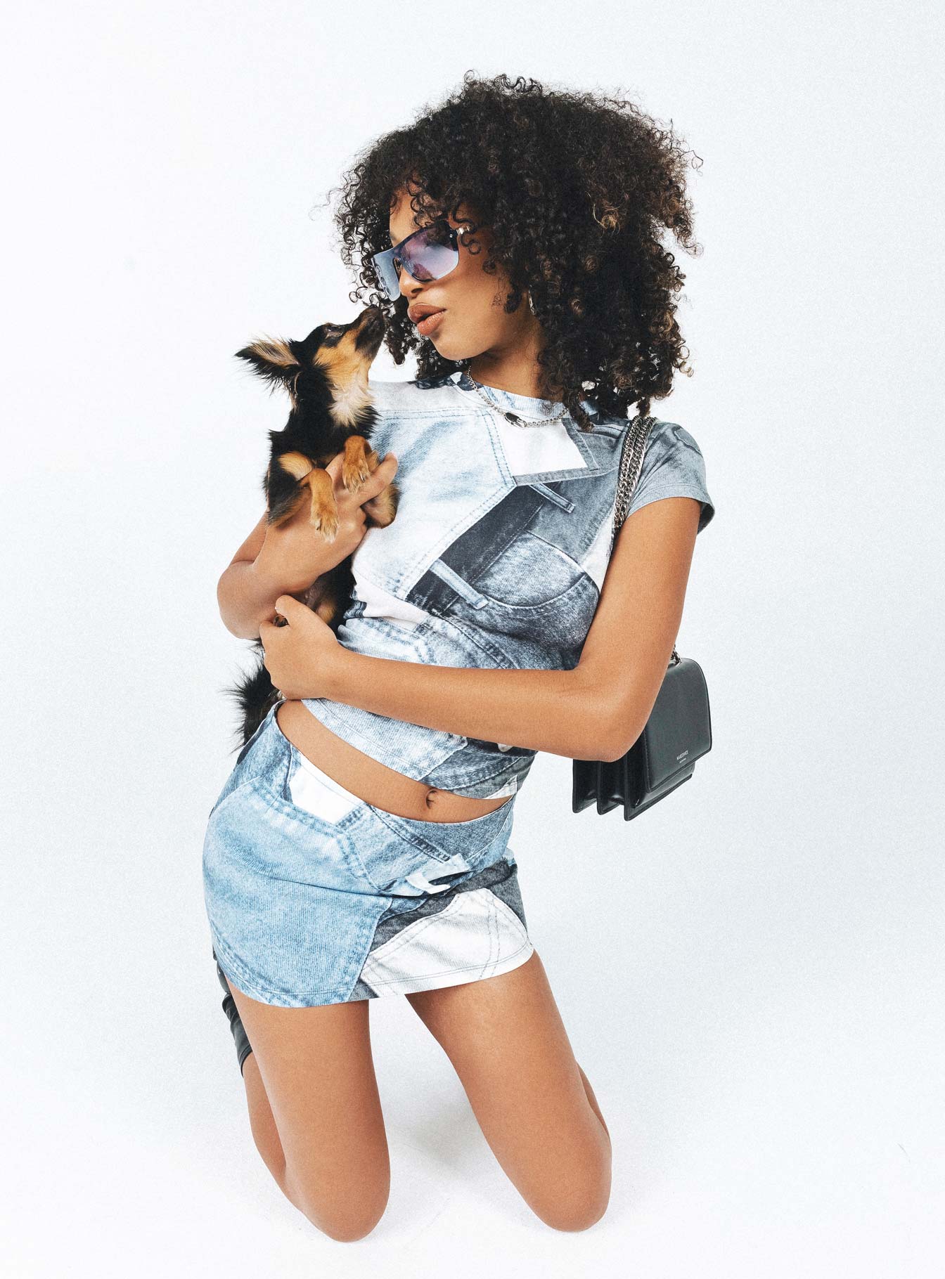 side view of model wearing Princess Polly Motel Tiona Top Denim Pocket Blue Short Sleeves High Neck 