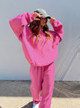 side view of model wearing Princess Polly Ritu Oversized Hoodie Pink Long 