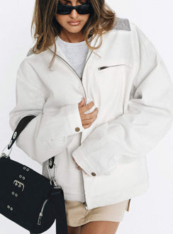 White jacket Classic collar Zip fastening at front Twin hip pockets  Chest pocket Press button fastening at cuff