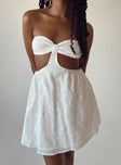 side view of model wearing Princess Polly Lulani Mini Dress White Sweetheart Neckline 