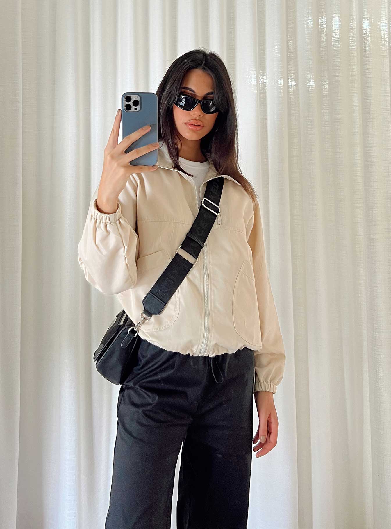 Jacket High neck Zip fastening at front Faux zip chest pocket  Twin hip pockets Drawstring waist Elasticated cuffs