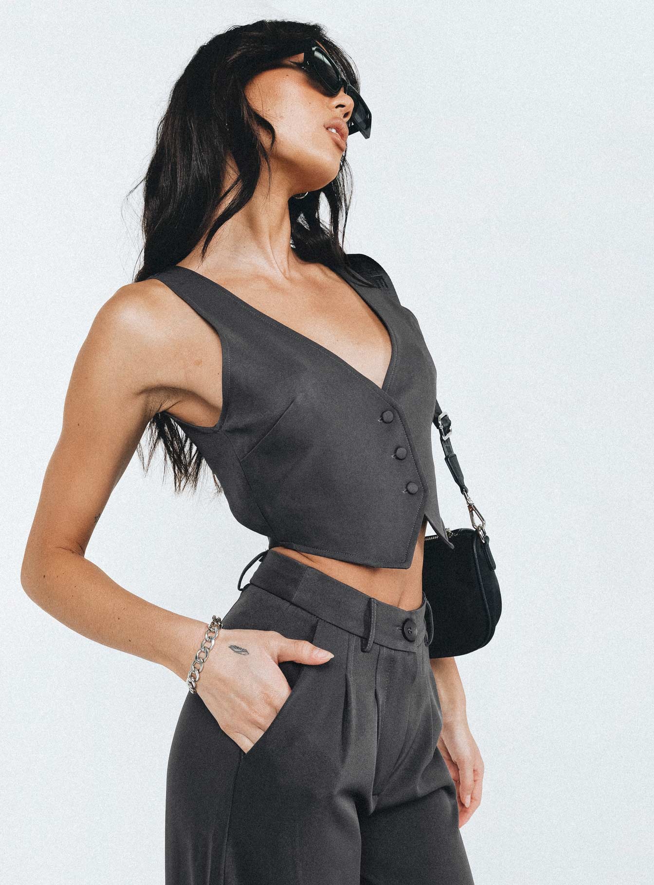 Front view of model wearing  front Princess Polly Sleeveless Asymmetric Neckline  Archer Vest Slate