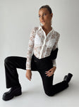 Front view of model wearing  front Princess Polly Full Sleeves Asymmetric Neckline  Iona Long Sleeve Top White