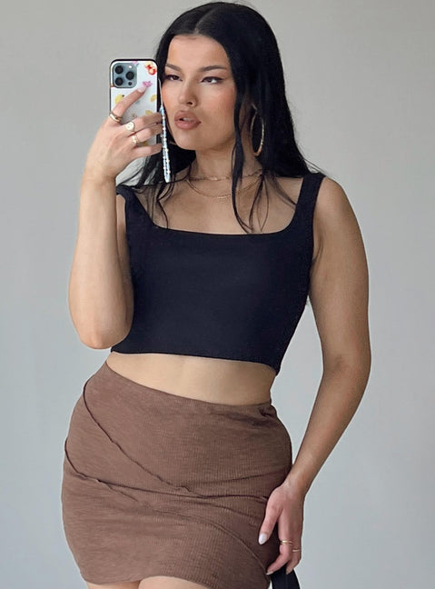 side view of model wearing Princess Polly Jace Top Black Sleeveless Square Neck 