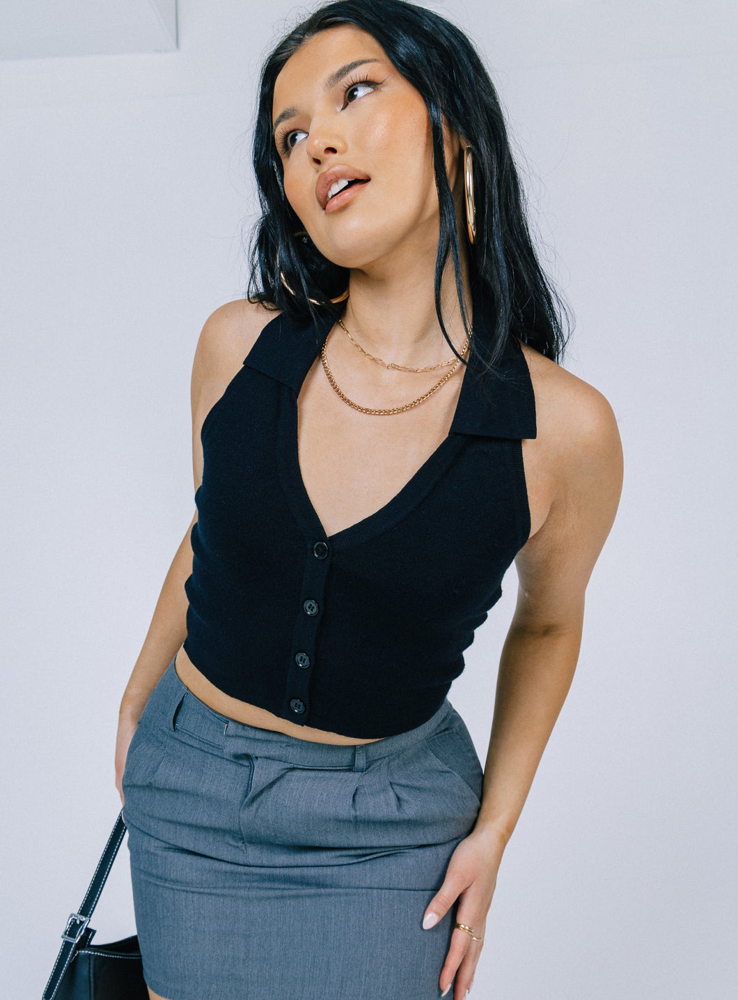 side view of model wearing Princess Polly Aydin Top Black Sleeveless V-Neck 