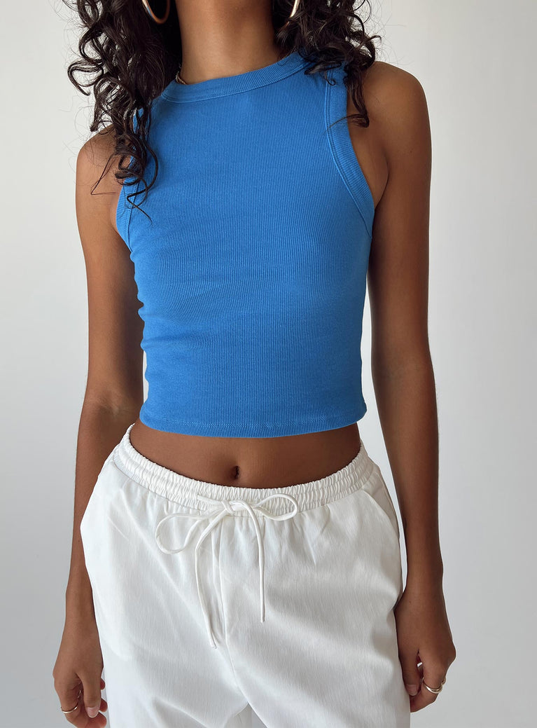 Front view of model wearing  front Princess Polly Sleeveless Crew Neck  Ashland Top Blue