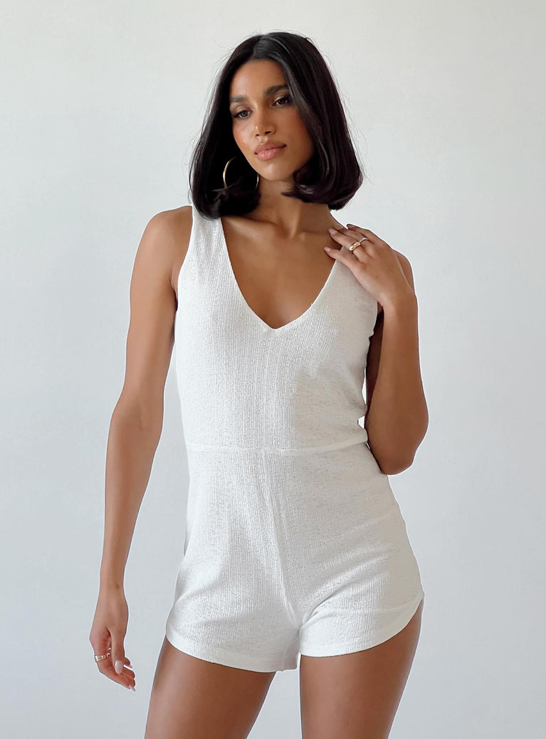 White romper Soft knit material  Delicate material - wear with care  Scooped neckline  Good stretch  Fully lined 