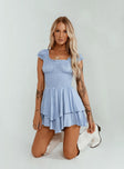 Romper Soft textured material Shirred waistband Ruffle detailing Elasticated neck and sleeves Can be worn on or off shoulder Layered ruffle hem Fully lined