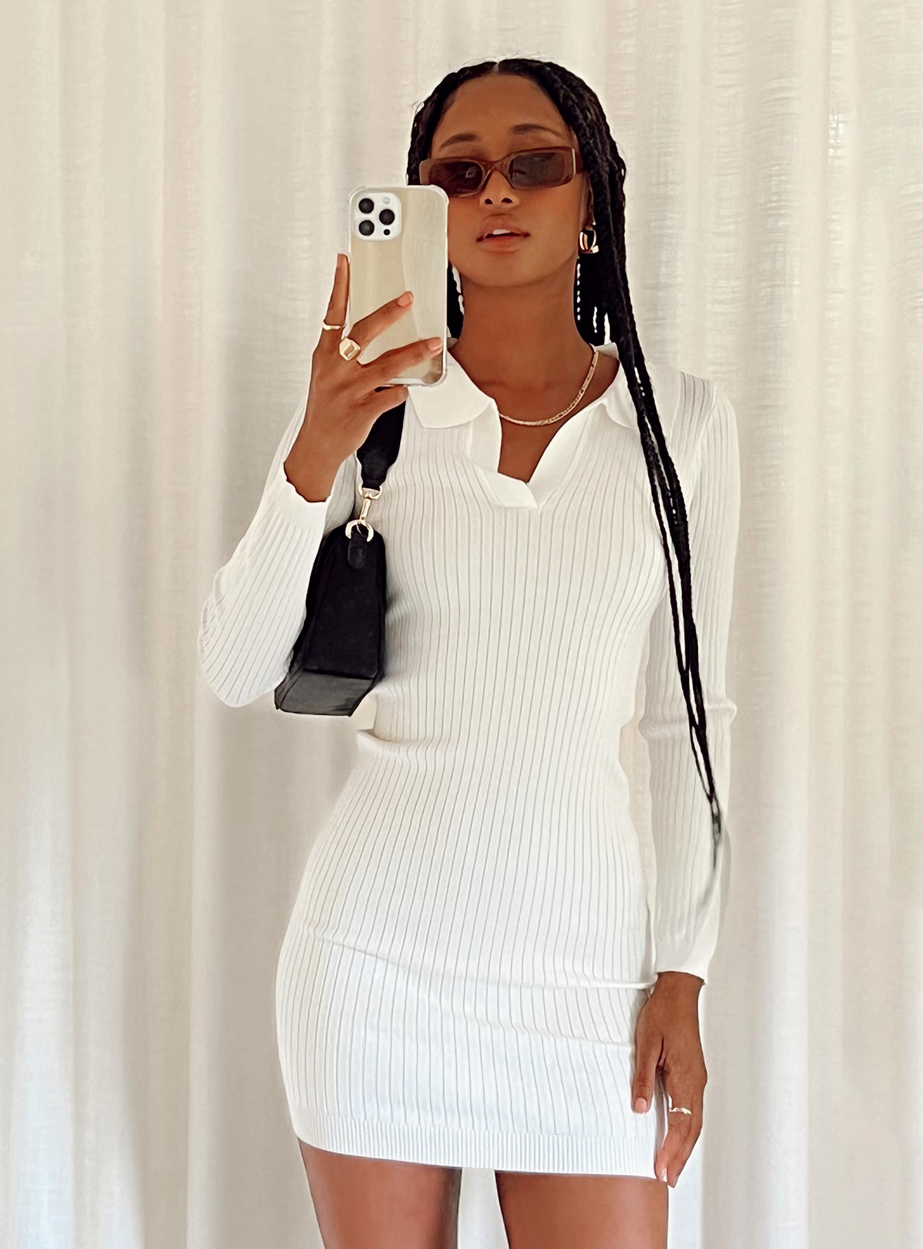 Front view of model wearing  front Princess Polly High Neck  Leanne Long Sleeve Mini Dress White