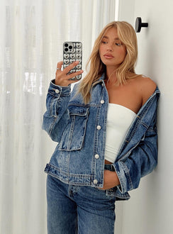 Oversized jacket Mid wash denim Classic collar Drop shoulder Button fastening at front Oversized chest pocket Single button cuff