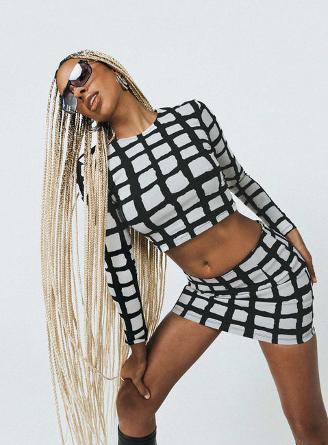 side view of model wearing Princess Polly Motel Bonnie Top Mesh Mono Painted Check Full Sleeves Crew Neck 