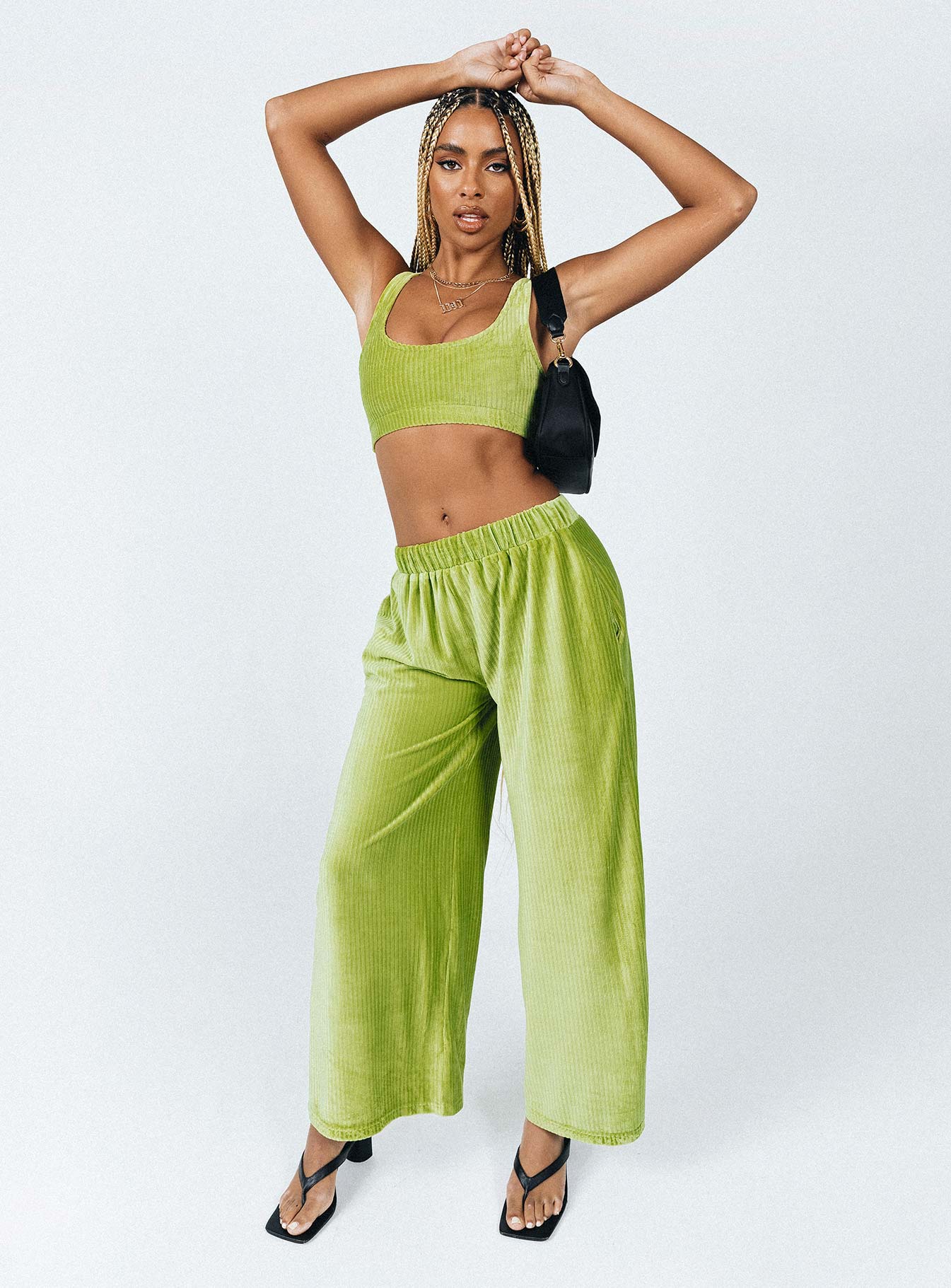Matching set Velour material  Crop top  High waisted pants  Elasticated waistband  Twin hip pockets  Wide leg 