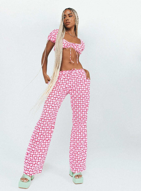Front view of model wearing  front Princess Polly  Motel Raya Trouser Apple Check Blush Red
