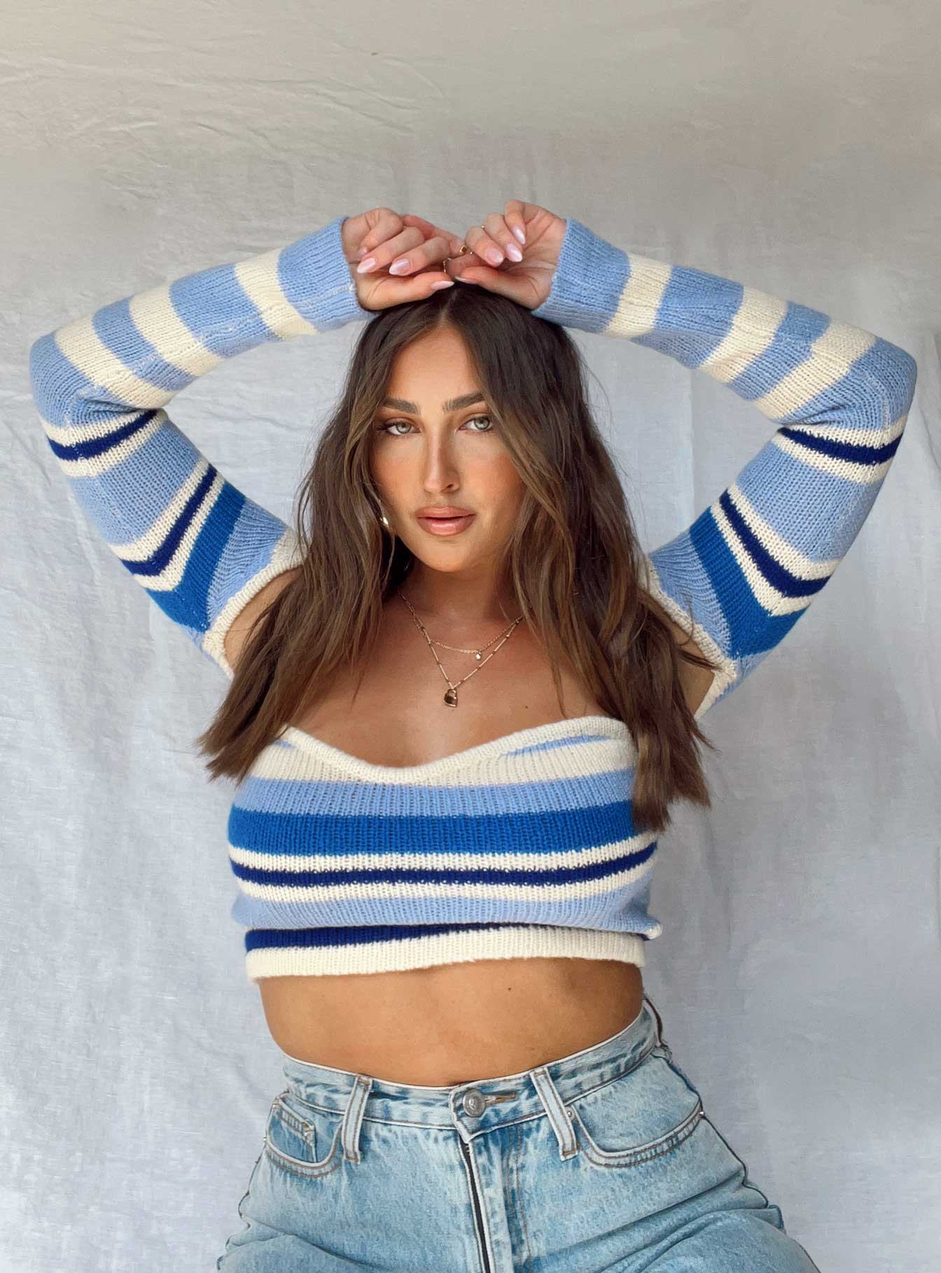 Front view of model wearing  front Princess Polly Full Sleeves Square Neck  Serafini Bolero Knit Top Blue