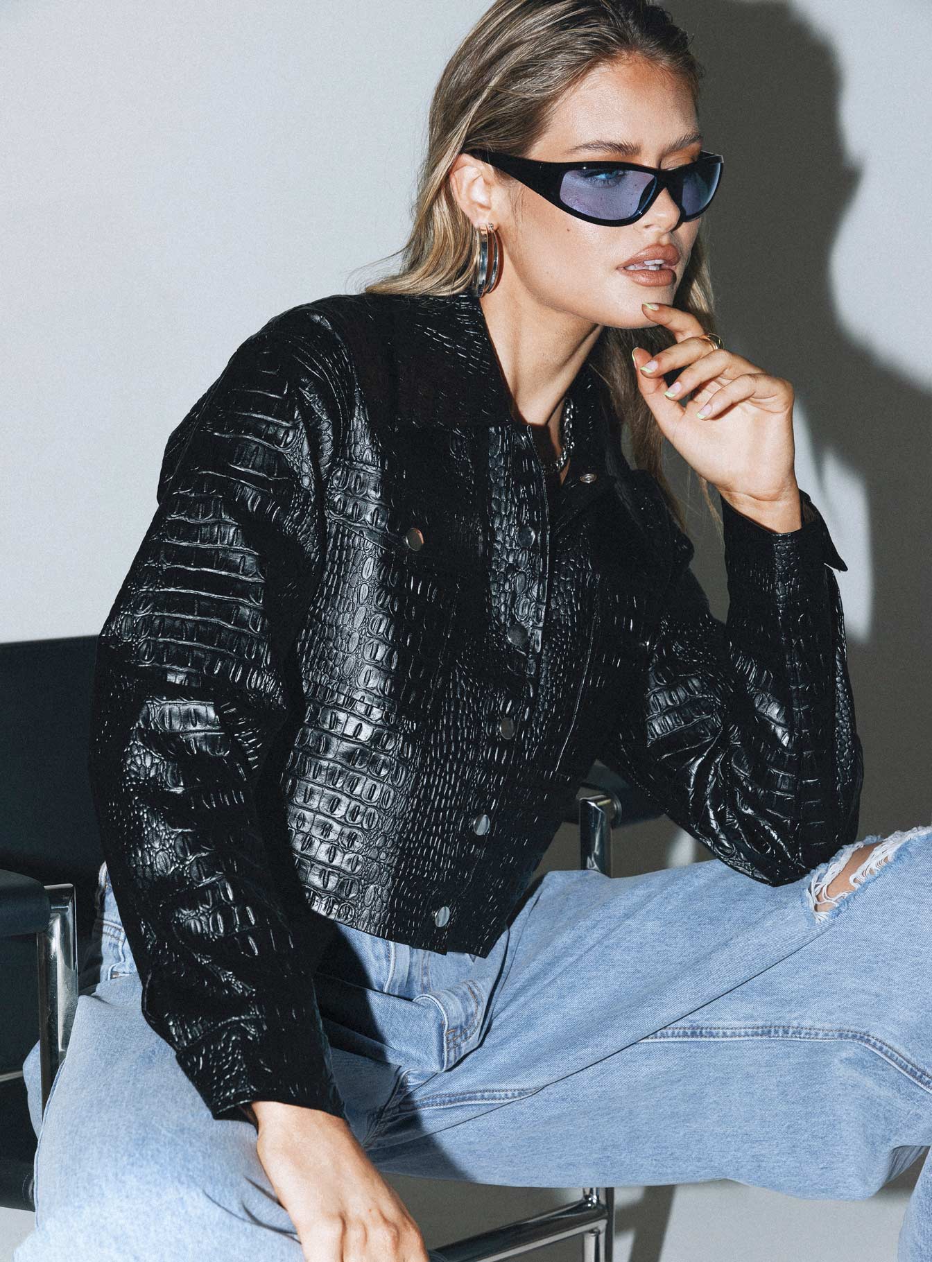 Cropped jacket Faux leather material Croc print Classic collar Press button fastening Twin chest pockets Single button cuff